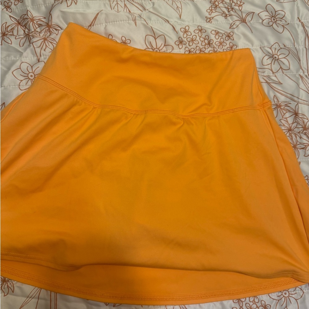 All in Motion Vibrant Orange Skort